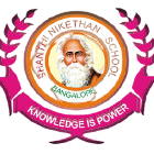 Shanthi Nikethan School Logo